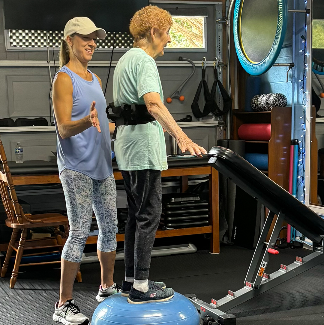 Rhonda Walsh working with a woman